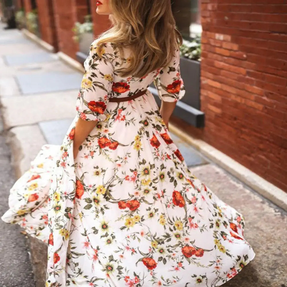 Klara – Blomstret Maxi Kjole med Elegant Swing