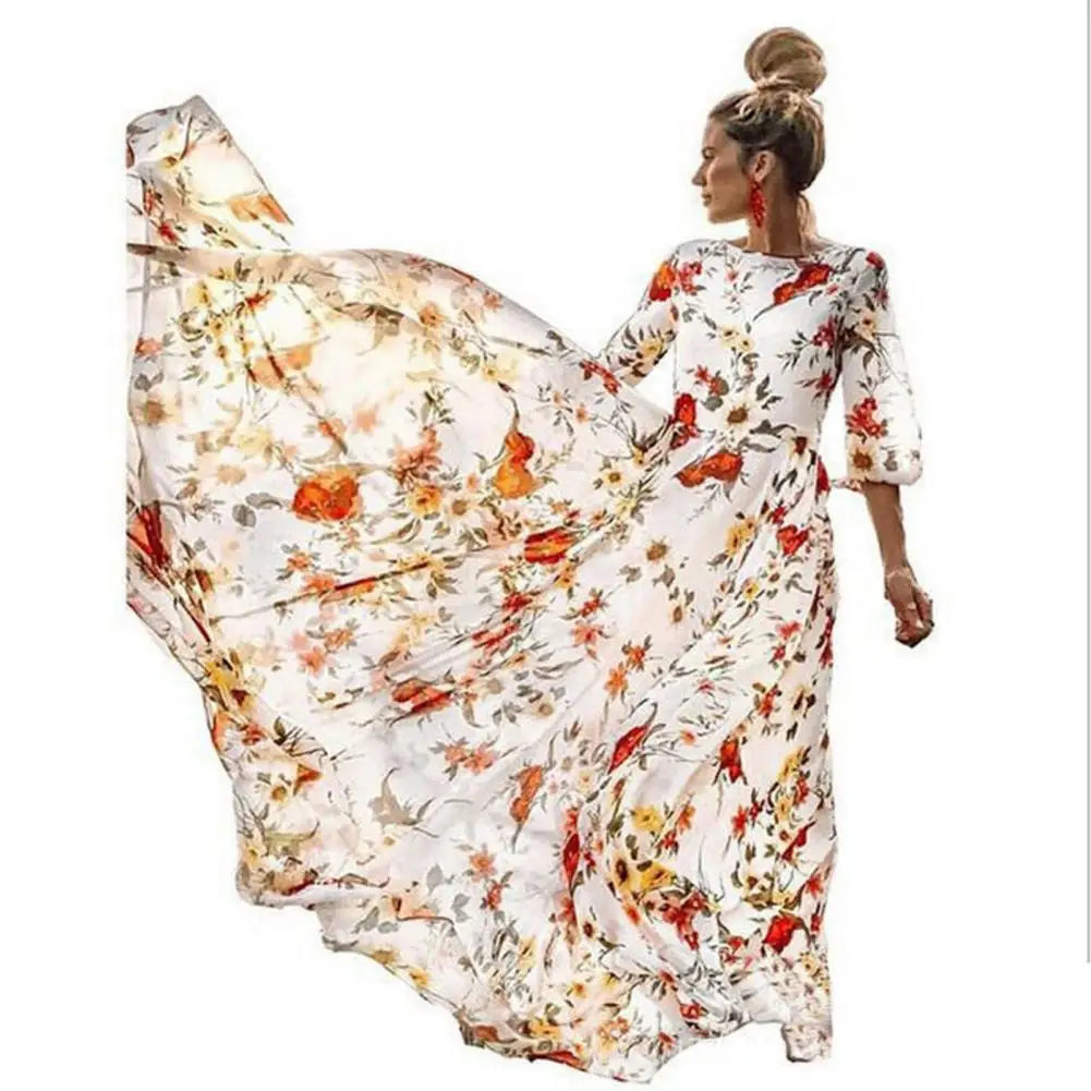 Klara – Blomstret Maxi Kjole med Elegant Swing